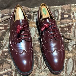 Christian Louboutin. I changed those shoestrings. Wore them a few times as well.